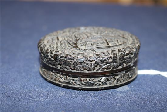 A 19th century Chinese export tortoiseshell circular box containing ivory gaming pieces